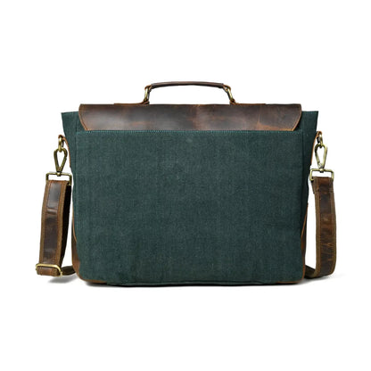 Back panel of the green canvas office bag showing the zip pocket and shoulder strap