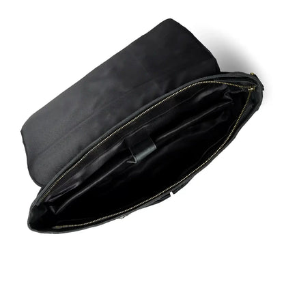 Open black office bag showing the lined interior and padded laptop compartment